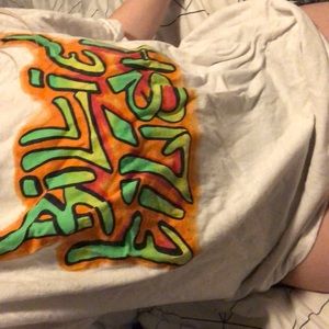 white, green and orange Billie Eilish t-shirt, size large